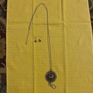silver and brown necklace and earrings